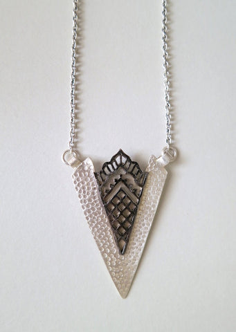 Artistic, arrowhead shape pendant necklace with black rhodium plated detailing - Lai