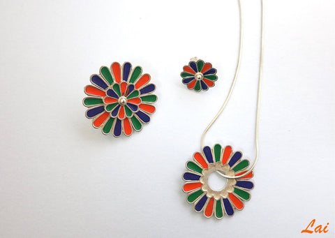 Artistic, modular earrings with removal enamel floral studs in center