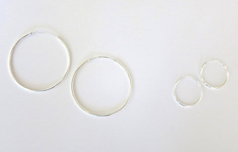 Big and small silver hoops