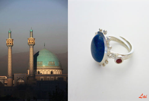 Classic, cabochon lapis lazuli ring with coral detailing