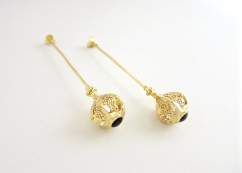 Elegant, stylish, gold plated long earrings with garnet - Lai