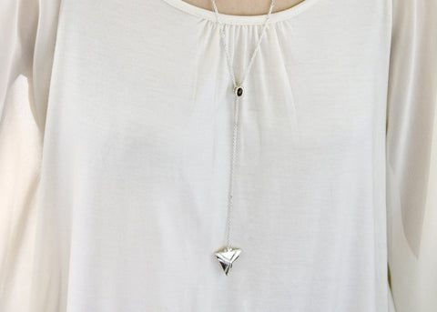 Elegant, vintage-inspired, sterling silver lariat necklace with a triangular granulation-work locket