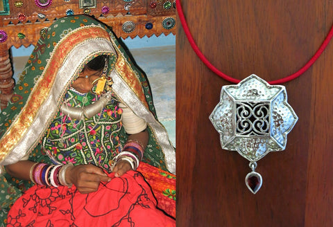 Gorgeous, Kutchi, 8 petal floral hammer finish pendant with jali work & a garnet drop - Lai