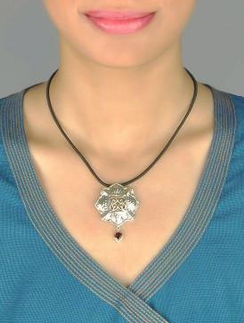 Gorgeous, Kutchi, 8 petal floral hammer finish pendant with jali work & a garnet drop - Lai