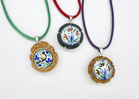 Rare, collectible, reversible carved gemstone pendants with fine enamel work (smaller)