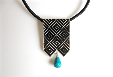 Stunning, long rectangular pendant with fine black enamel work and a turquoise drop - Lai