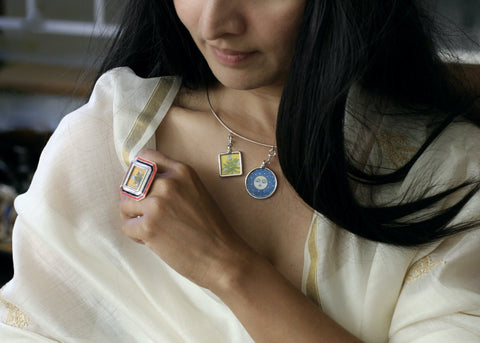 Story-rich, head-turning, hasli (neck ring) with miniature painting pendants