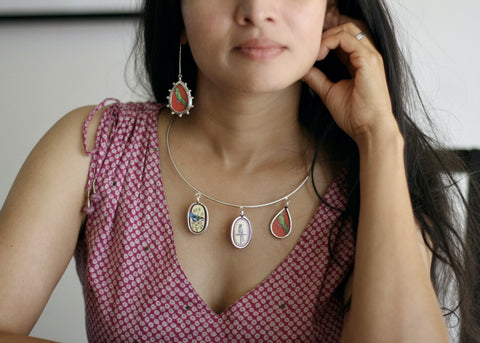 Story-rich, head-turning, hasli (neck ring) with miniature painting pendants