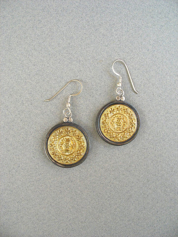 Elegant, Thappa (stamped) round gold-plated earrings with oxidized silver frame  Earrings Sterling silver handcrafted jewellery. 925 pure silver jewellery. Earrings, nose pins, rings, necklaces, cufflinks, pendants, jhumkas, gold plated, bidri, gemstone jewellery. Handmade in India, fair trade, artisan jewellery.