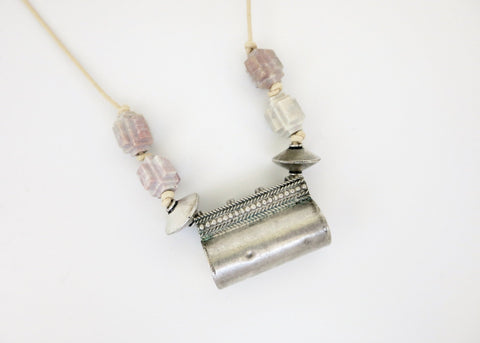 Architecturally inspired, tubular Rajasthani tribal amulet