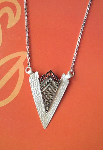 Artistic, arrowhead shape pendant necklace with black rhodium plated detailing - Lai