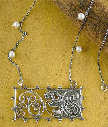 Artistic, rectangular paisley pendant on pearls interspersed chain - Lai