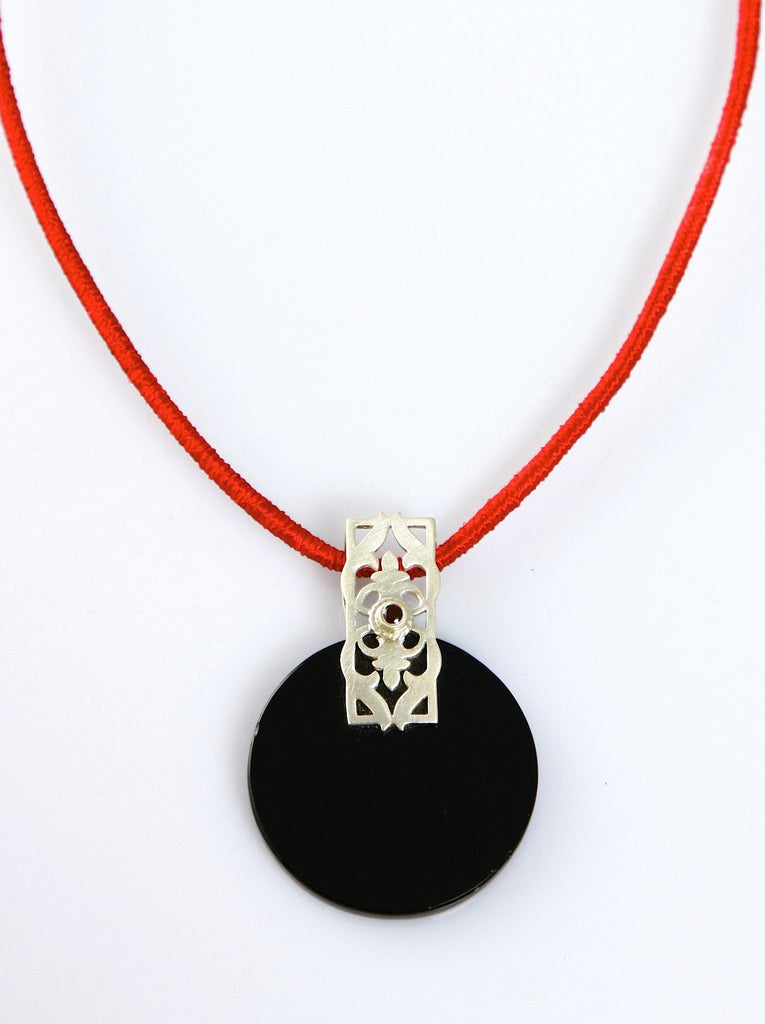 Beautiful, round black glass pendant with silver and garnet accent - Lai