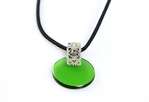Beautiful, round black glass pendant with silver and garnet accent - Lai