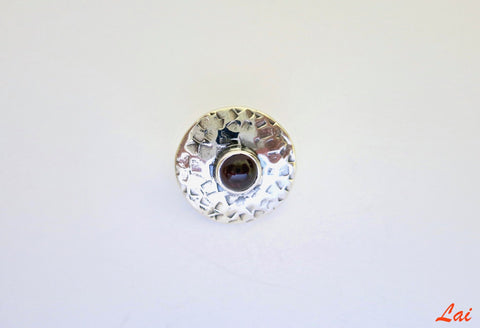 Big, round, textured nose pin with garnet center - Lai