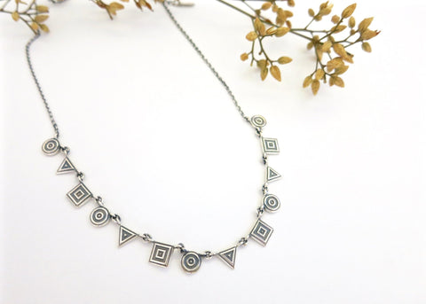Chic, neo-tribal, geometric medley necklace
