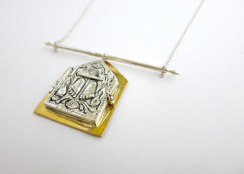Conversation-starting, bi-metal necklace with a large statement deity amulet - Lai