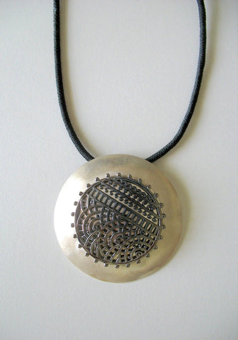Dramatic, big round pendant with black rhodium plated mehndi-inspired center - Lai