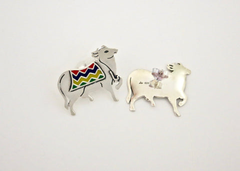 Dramatic 'Gau' (cow) studs - Lai