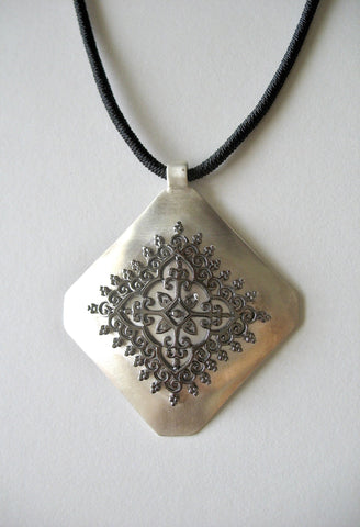 Gorgeous, kite-shaped pendant with mehndi-inspired black rhodium plated center unit - Lai