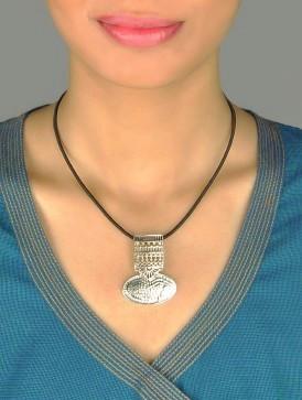 Graceful and artistic, Kutch-inspired, long pendant with hammer finish and intricate jali work - Lai