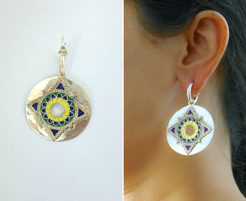Show-stopping earrings with a dangling enamel disc on small open hoop - Lai