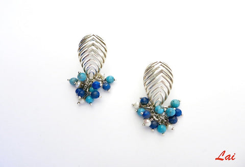 Striking, cut-work earrings with lapis, turquoise and pearls cluster