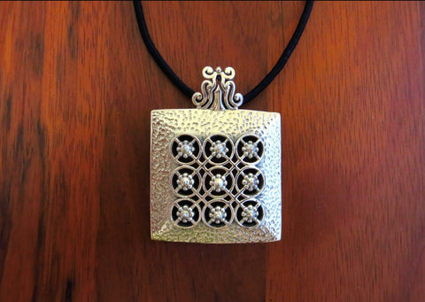 Stunning, Kutch-inspired, large hammer-finish square pendant with jali