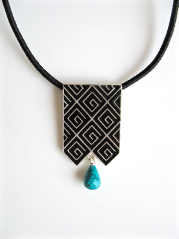 Stunning, long rectangular pendant with fine black enamel work and a turquoise drop - Lai