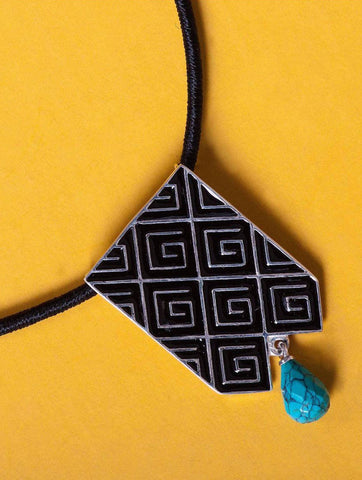 Stunning, long rectangular pendant with fine black enamel work and a turquoise drop - Lai