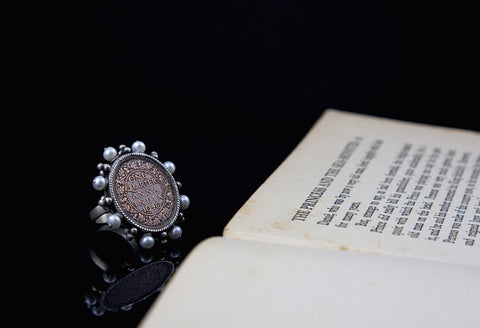 Vintage Indian-coin statement ring framed with pearls